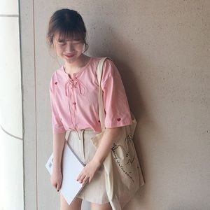 Pink lace up top with hearts